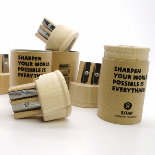 Wooden pencil sharpener with recycled card pot double cavity